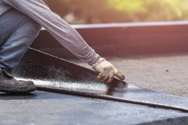 Professional Basement Waterproofing technician working in Nesconset, NY